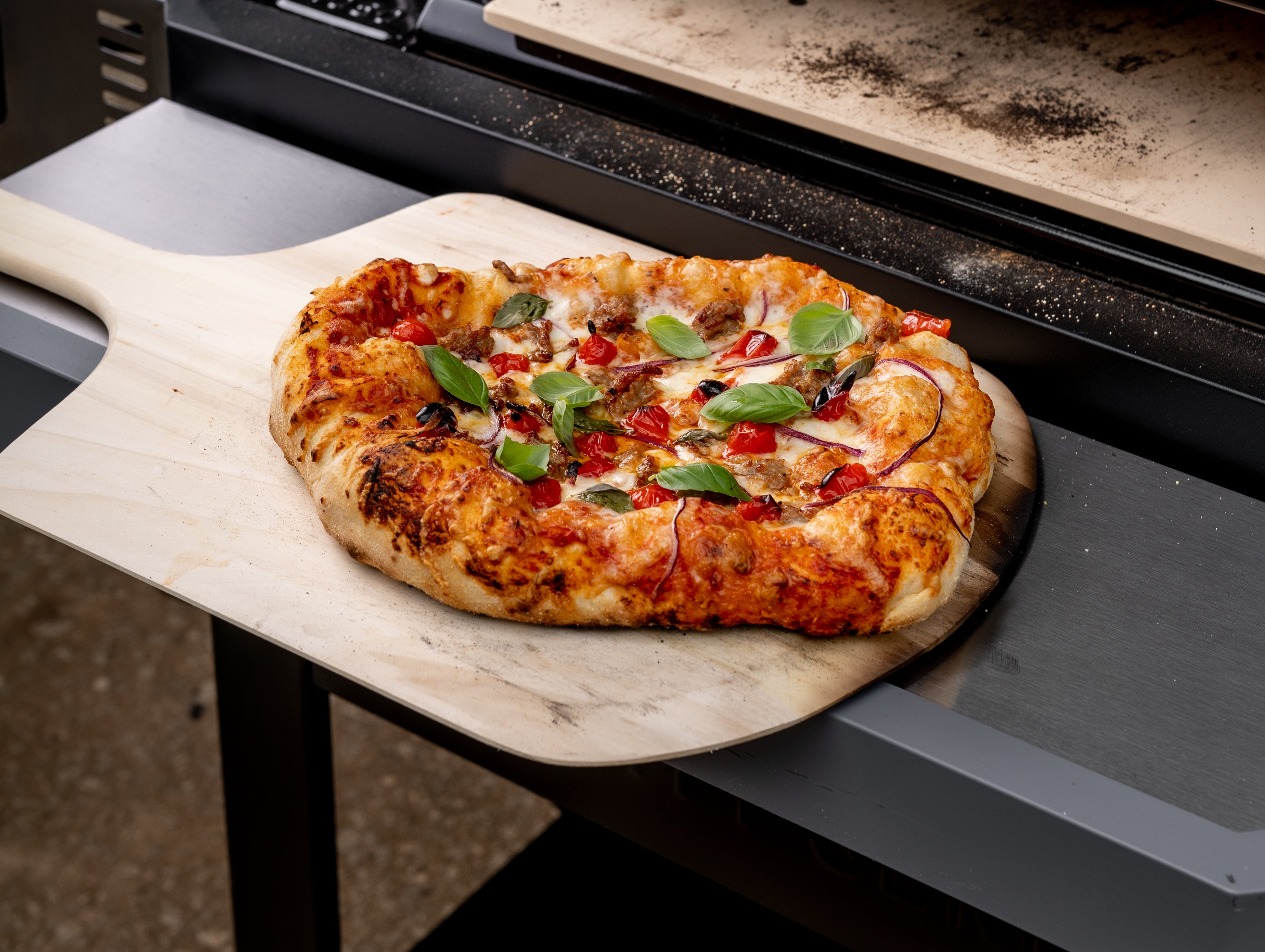 Sausage Tomato Basil Pizza using the Masterbuilt Pizza Oven