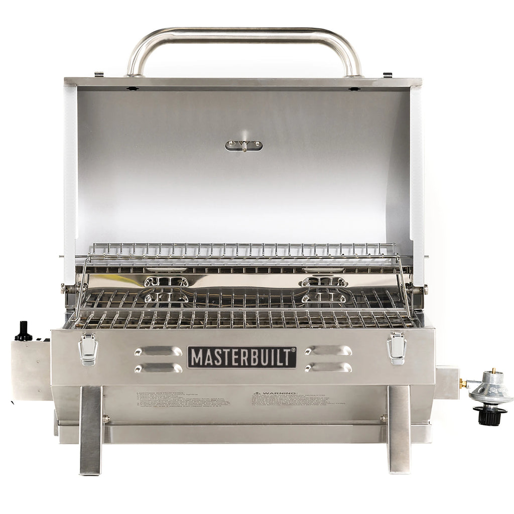 Open tabletop grill showing cooking rack and warming rack