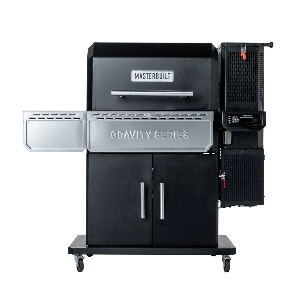 Masterbuilt Gravity Series 1150 Digital Charcoal Grill + Smoker. Charcoal hopper is to the left of the grill and has embedded control panel. Foldable front and side shelves cross the grill body and out the left side. The grill sits on an enclosed cart with wheels.