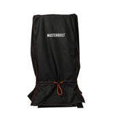 Black cover installed over a vertical smoker with legs. The orange drawstring is pulled tight at the top of the legs. The name MASTERBUILT is printed in white on the cover.